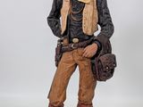 figurine représentant un homme en tenue de cow-boy, avec un chapeau et des bottes