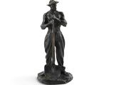 an image of a statue of a man with a hat and a cane