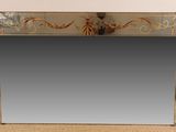 an image of a mirror sitting on top of a carpeted floor