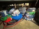 a pile of wires and hoses sitting on the floor