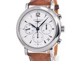a close up of a wrist watch with a white dial and brown leather strap