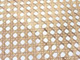 a close up picture of a wicker table cloth