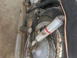 a motorcycle that is parked in a garage