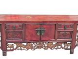 a wooden table with drawers and drawers on top of it