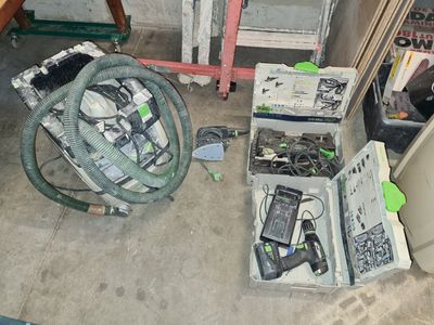 a lot of electronics that are sitting on the floor