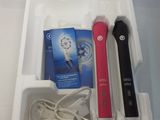 a toothbrush, toothpaste, toothpaste, and other items in a box
