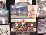 a lot of games on display on a black table