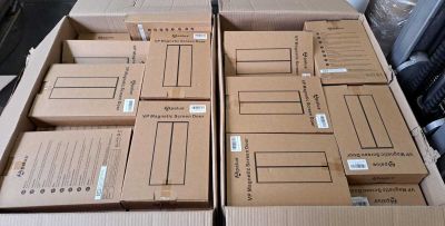 several boxes are stacked on top of each other on a table