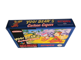 a box of yogi bear ' s cartoon games on a white background