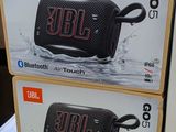 two boxes of jbl bluetooth speakers sitting on top of each other