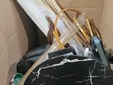 a cardboard box with a bunch of items inside of it