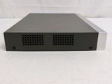a close up of the front of a black box on a white surface