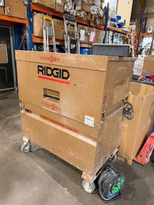 a cart that is sitting in the middle of a warehouse