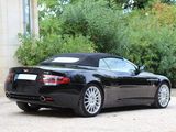 a black sports car parked in front of a building