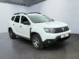 the white dacia is parked in a large white room