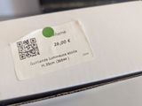 a box with a qr code on it sitting on a table