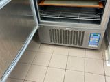 a small oven with a lot of food inside of it