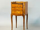 an old wooden chest of drawers with a drawer on one side and a drawer on the other