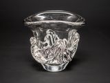 a clear glass vase with an octopus design on it