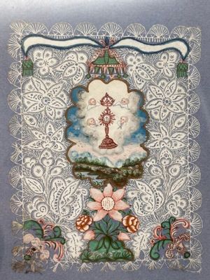 une image représentant une croix et des fleurs sur fond bleu