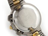 an image of a close up of a wrist watch on a white surface