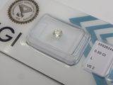 a close up of a diamond on a card on a table