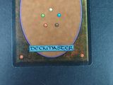 a picture of a deckmaster card on a table