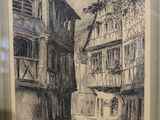 drawing of a street scene in a city with buildings in the background