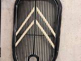 an image of a grill with a grill grate attached to it