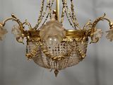 an image of a chandelier with flowers hanging from it ' s ceiling