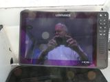 a man taking a picture of himself in the mirror of a car