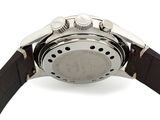 watch on a white surface with a black strap around the wrist