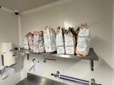many bags of food on the shelves in the kitchen