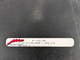 a close up of a black case with a red and white sticker on it