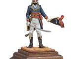 statue d'un homme en uniforme militaire tenant une épée et un chapeau