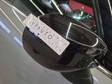 a close up of a car mirror with a sticker on it