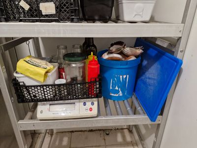 a shelf that has a lot of items in it
