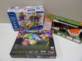 a box of toys and a toy gun on a table