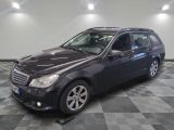 a picture of a mercedes c - class in a showroom