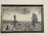 une photo d'une photo représentant un phare, dans un cadre