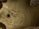 a close up of a skateboard with a smiley face on it