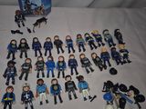 a lot of action figures that are on the table