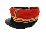 a red and black hat on a white background