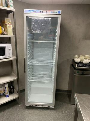 an image of a commercial refrigerator in a kitchen