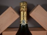 a bottle of wine that is sitting on a table
