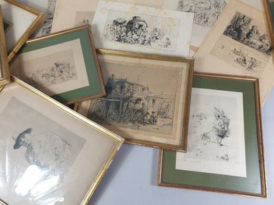 many framed pictures of animals on the table