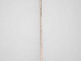 an image of a sword that is standing on a table