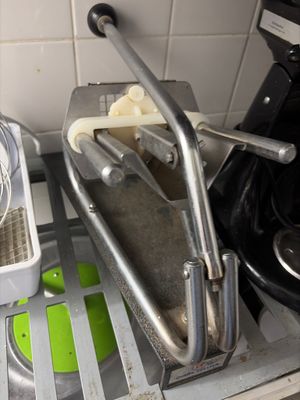 a pan of food on the counter next to a blender