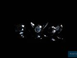 a group of three black diamonds on a black background