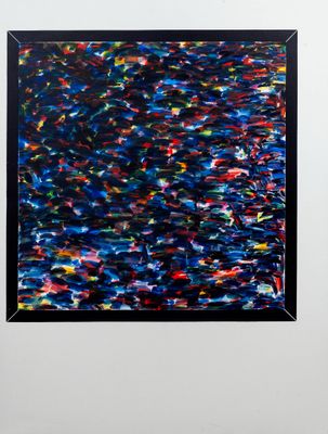 an abstract painting of blue, red, and black paint on a white wall